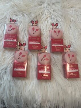 6 Disney Piglet Pink Macaron Lip Balm from the cream shop. Retails $9.99 each.